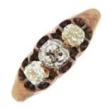 A late Victorian 9ct gold old-cut diamond three-stone ring.