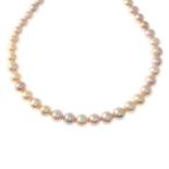 A freshwater cultured pearl single-strand necklace, with 9ct gold spherical push-piece clasp.