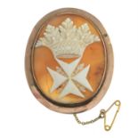 An early 20th century gold shell cameo brooch, depicting a Maltese cross and crown.