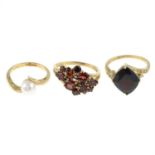 Three 9ct gold gem-set rings.