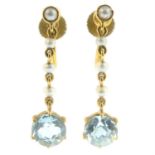 A pair of early 20th century gold aquamarine and seed pearl drop earrings.