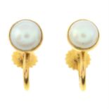 A pair of split pearl earrings.