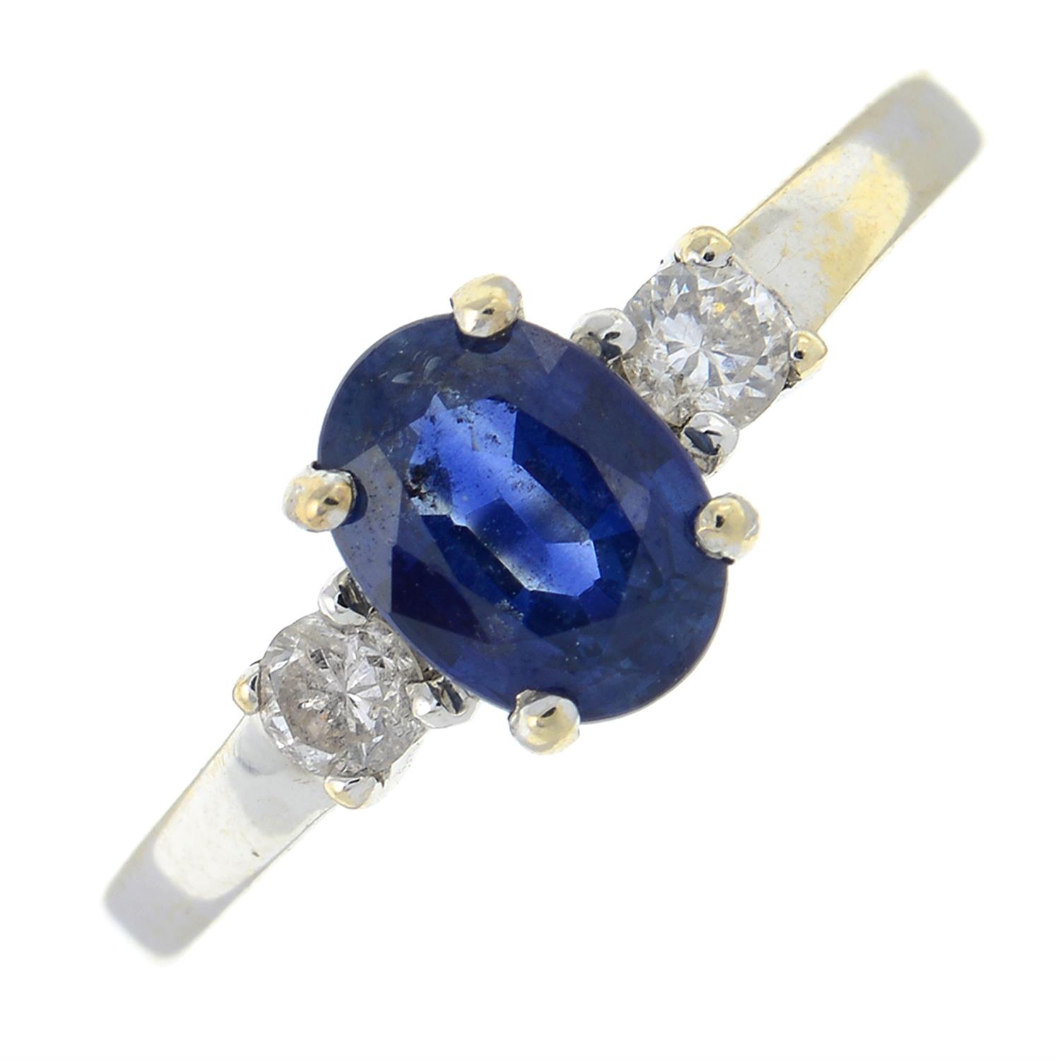 An 18ct gold sapphire and diamond three-stone ring.