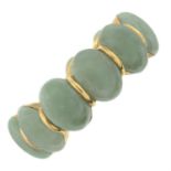 A jade cabochon full eternity ring.