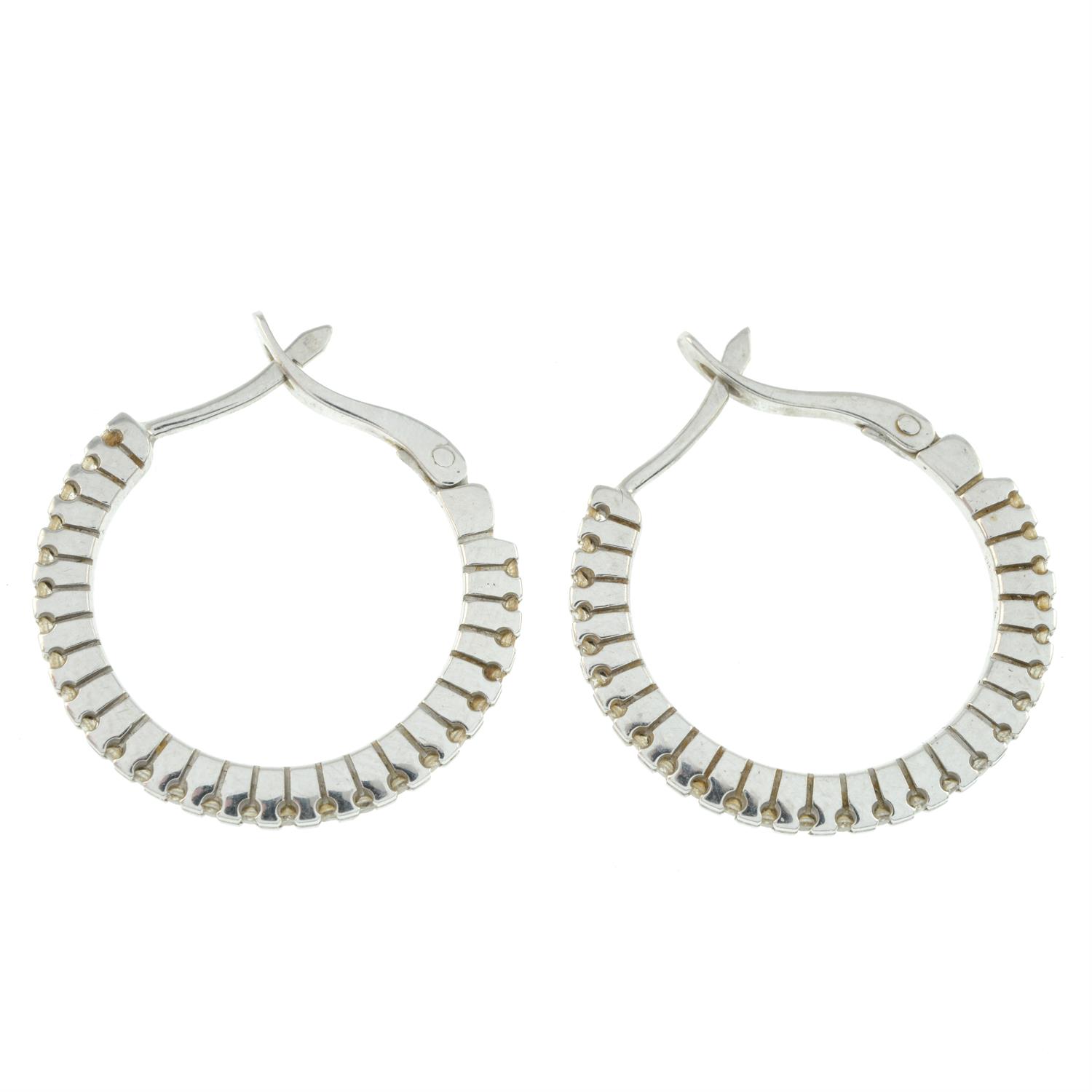 A pair of diamond hoop earrings. - Image 2 of 2