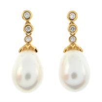 Diamond & cultured pearl drop earrings.