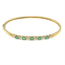 9ct gold emerald & diamond hinged bangle.