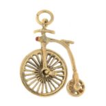 9ct gold penny-farthing pendant.