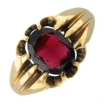 A 9ct gold garnet single-stone ring.