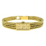 A lady's mid 20th century 18ct gold wrist watch, by Omega.