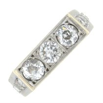 Diamond three-stone ring with diamond shoulders