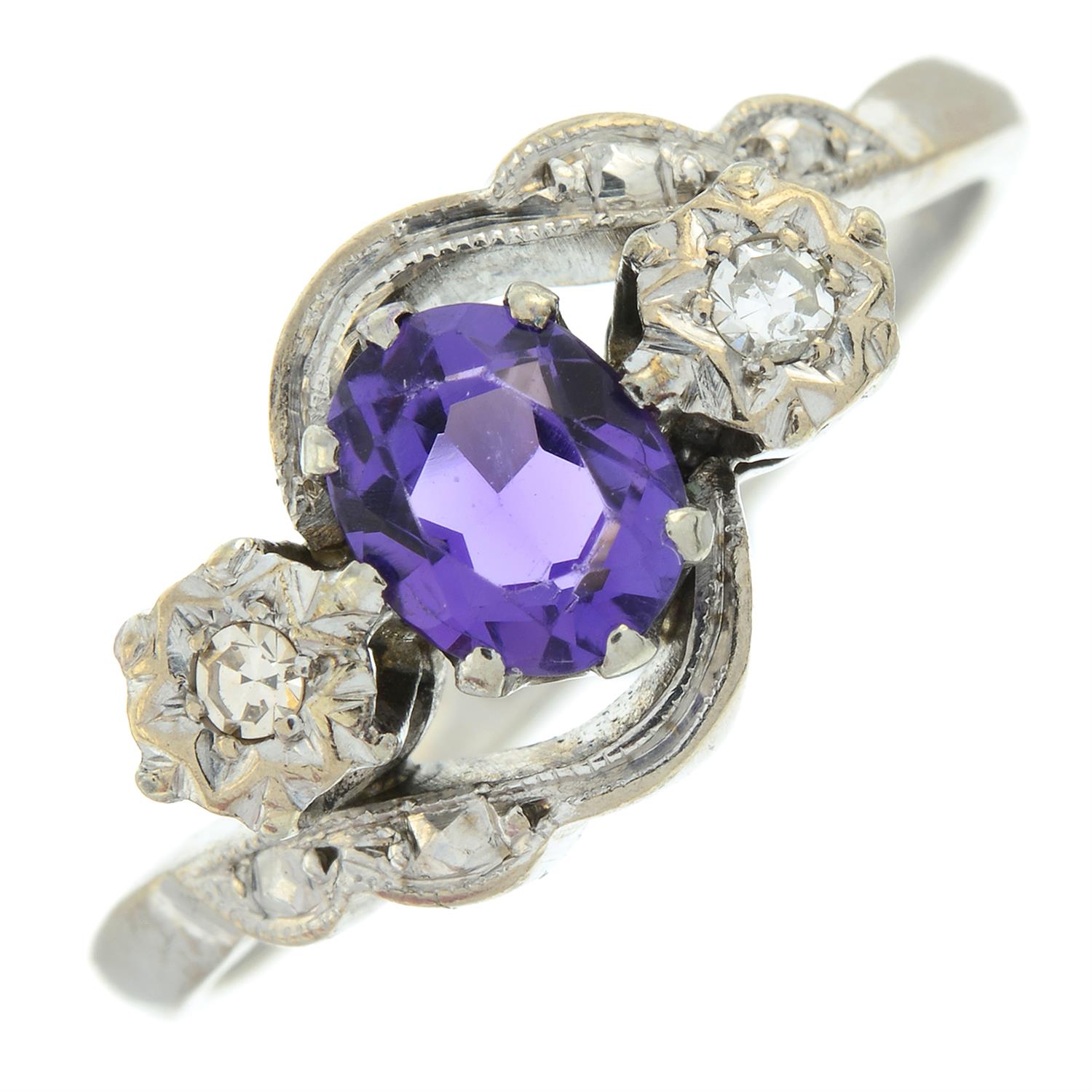 Amethyst and illusion-set diamond three-stone crossover ring