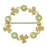 Early 20th century 15ct gold peridot & split pearl wreath brooch