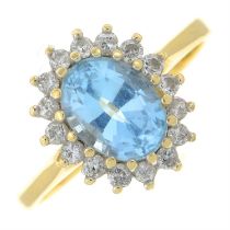 18ct gold blue topaz and diamond cluster ring