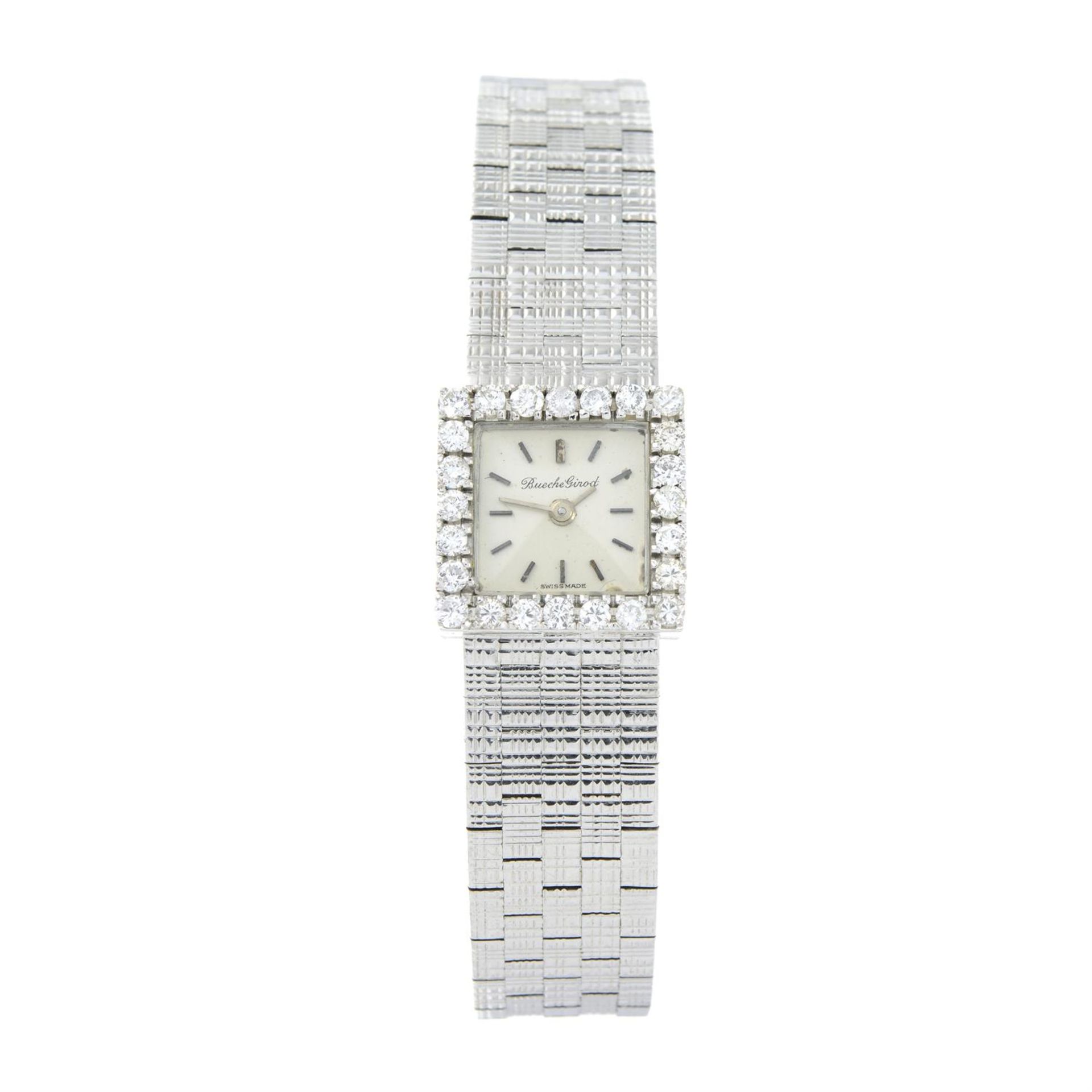 Mid 20th century textured 18ct gold wrist watch, with brilliant-cut diamond bezel,