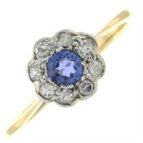 An early 20th century 18ct gold diamond and sapphire floral cluster ring.