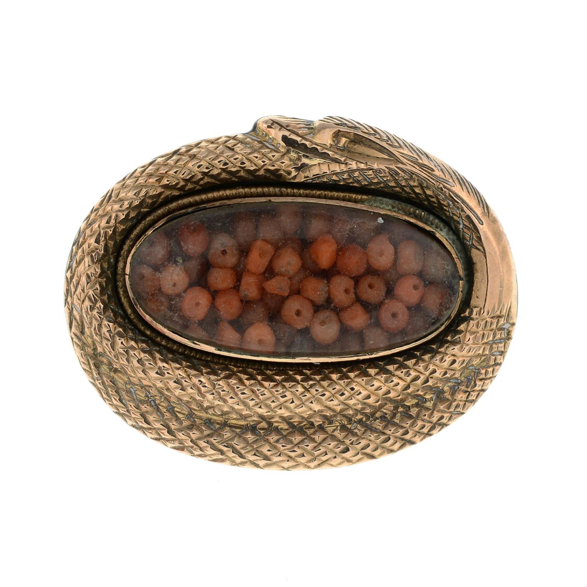 Georgian Ouroboros brooch, with later coral beads