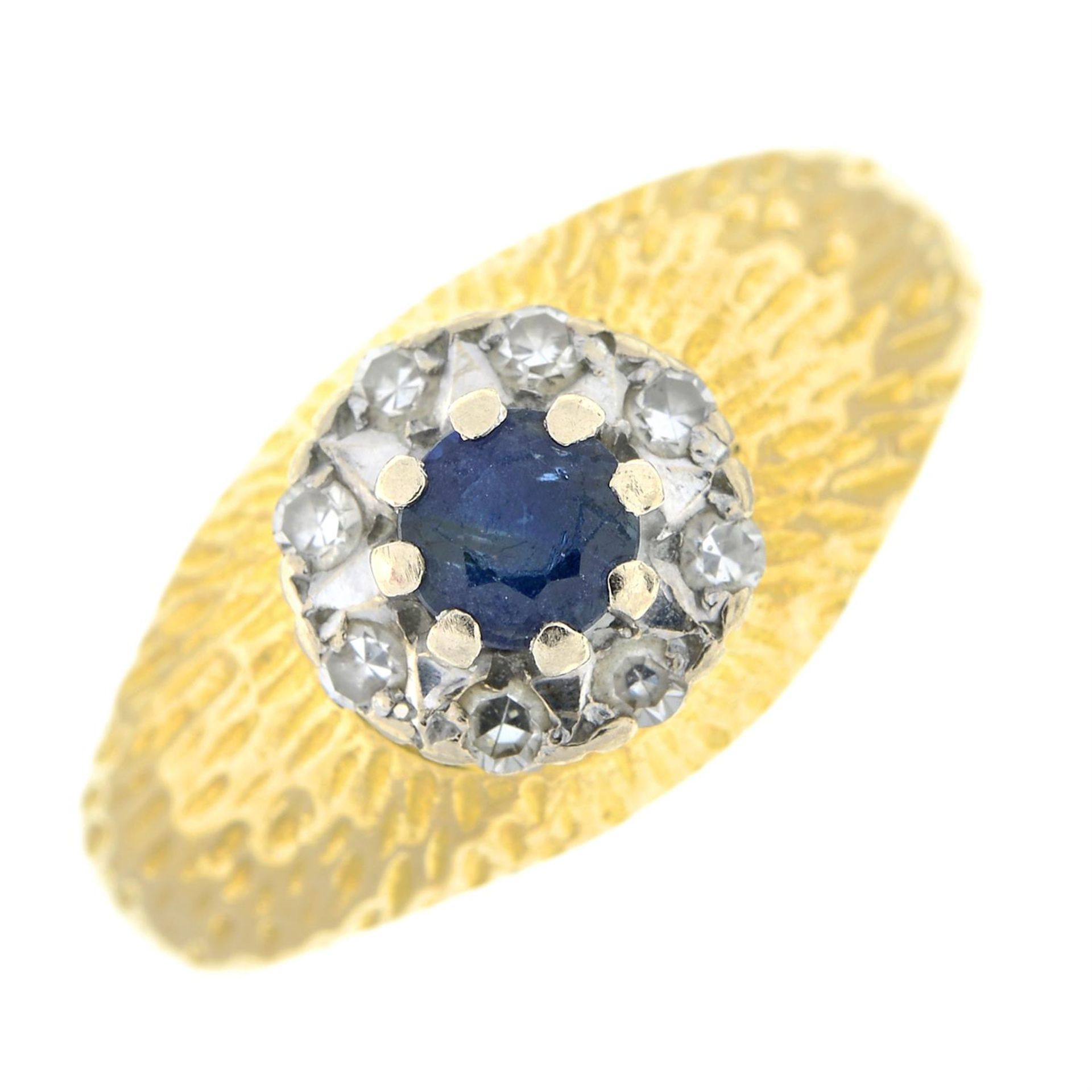 18ct gold sapphire and diamond cluster ring.