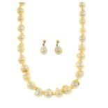 Cultured pearl necklace & earrings.