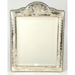 A modern silver mounted mirror