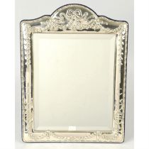A modern silver mounted mirror