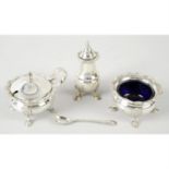 A mid-20th century silver three piece condiment set.