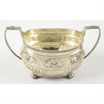 A George III silver twin-handled bowl.