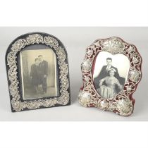 Two early 20th century silver mounted photograph frames. (2).