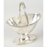 A George III silver pedestal sugar basket.