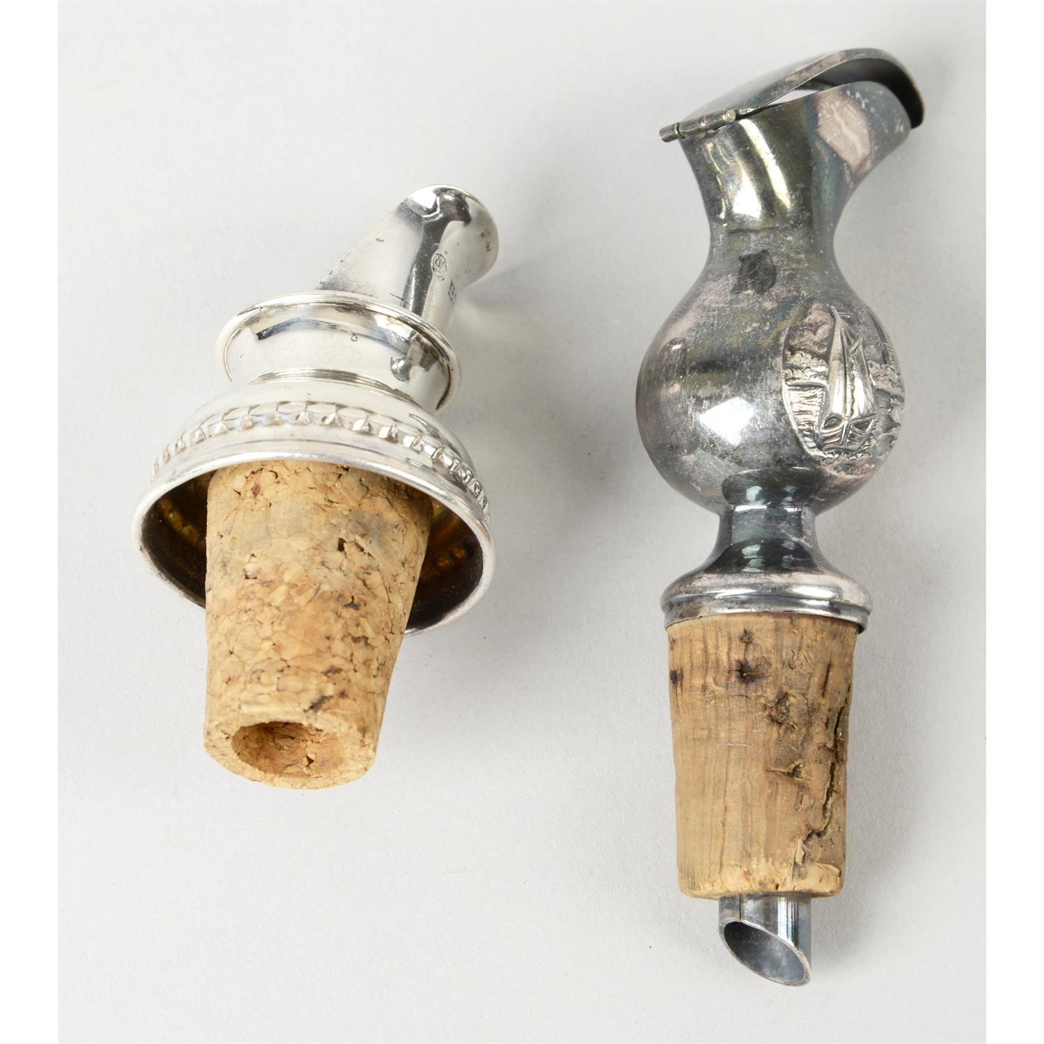 A modern silver mounted bottle pourer; together with an unmarked example. (2).