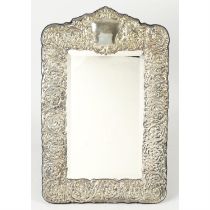 A large, modern silver mounted easel-back mirror.