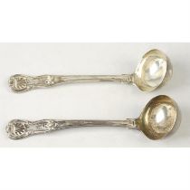 A pair of George IV silver toddy ladles.