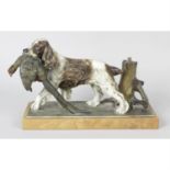 A 1930s cold painted spelter match striker modelled as a retriever.