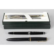 A small selection of pens, to include Montblanc, Cross and Parker examples.