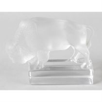 A Lalique paperweight modelled as a bison.