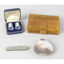 A mixed selection of assorted items to include a small selection of thimbles.
