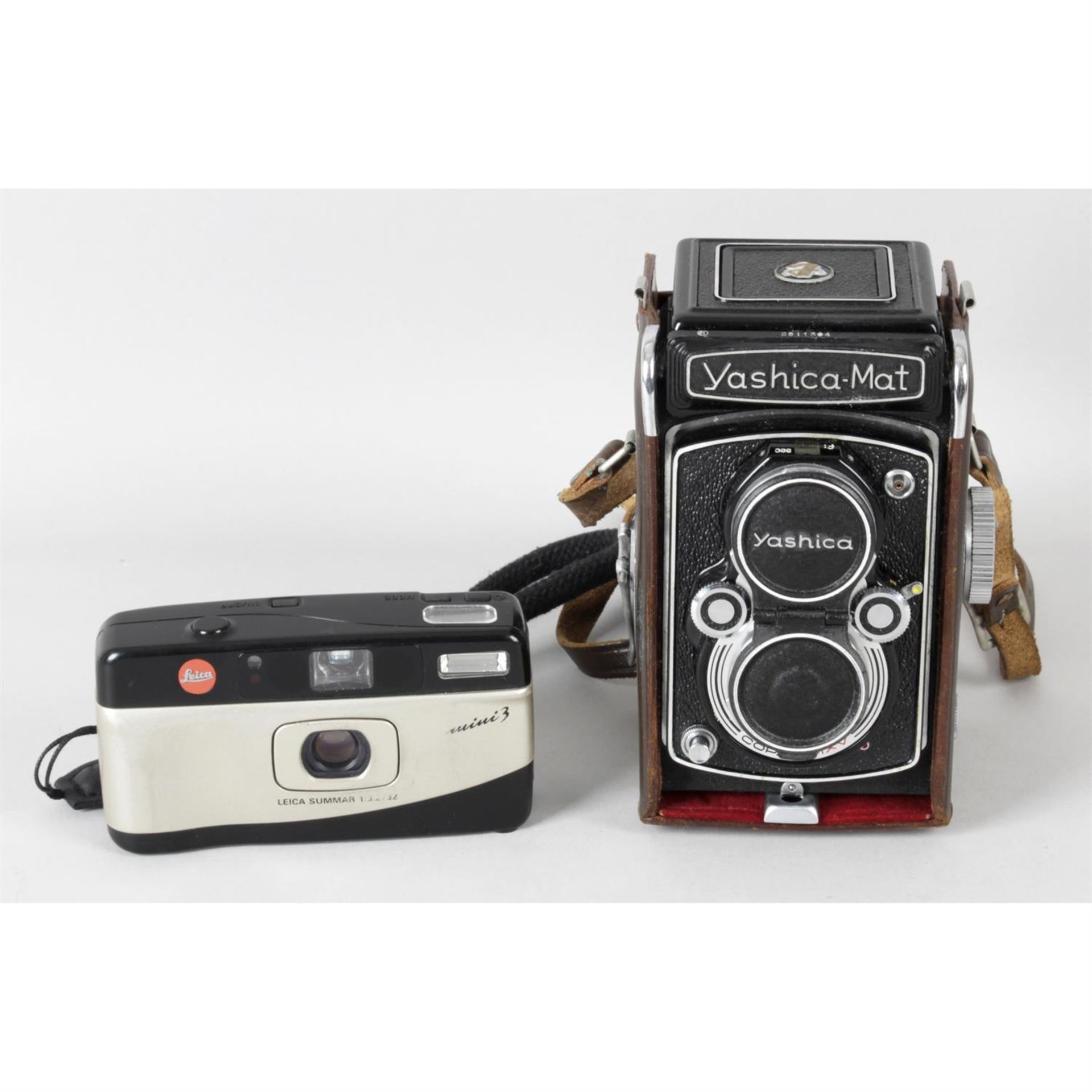 A Leica Sumnar and Yashicamat camera