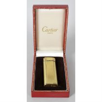 A Cartier gold plated lighter