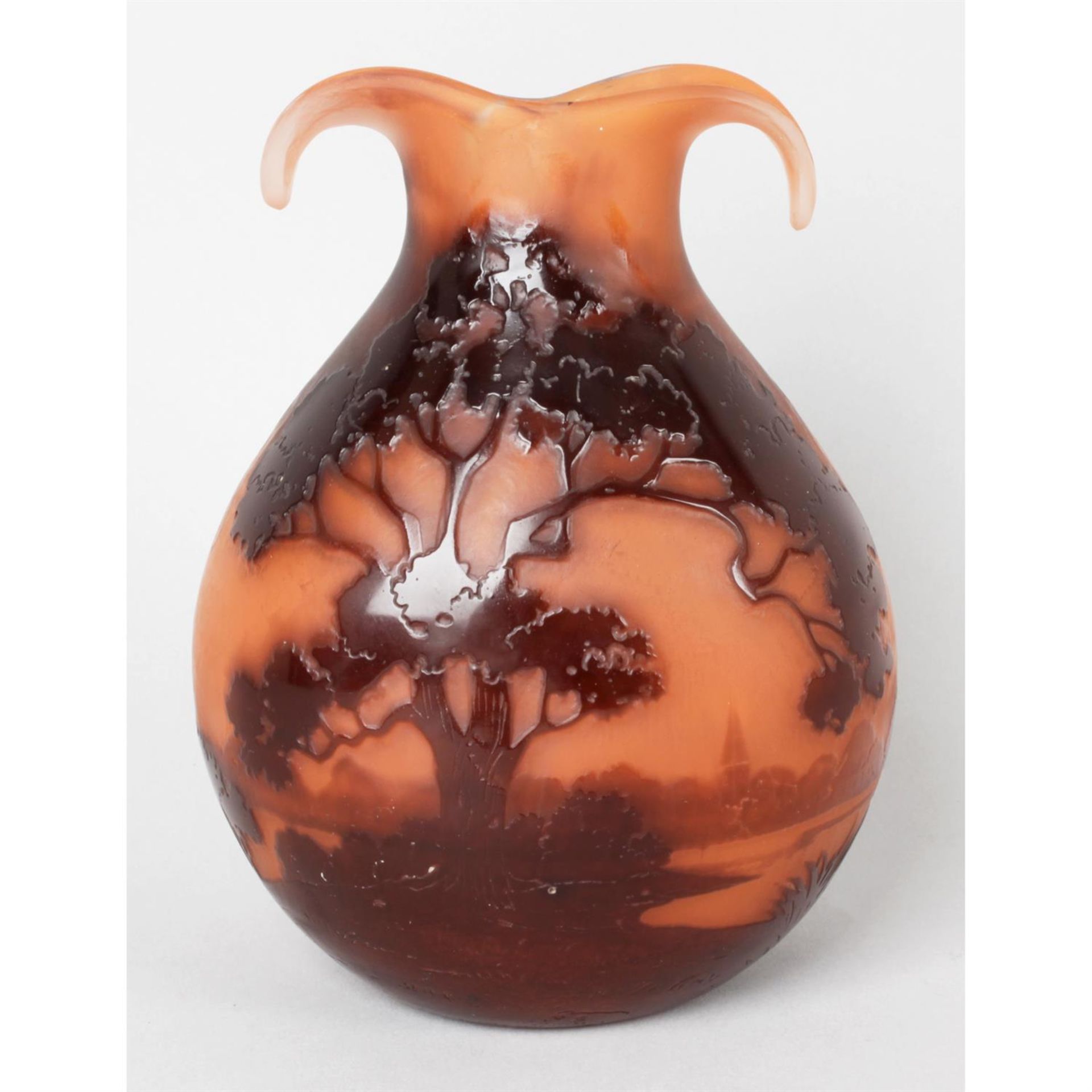 An Andre Delatte orange and brown cameo glass vase.