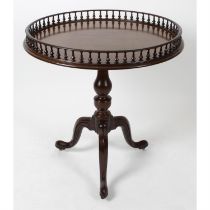 A 19th century mahogany snap top table.