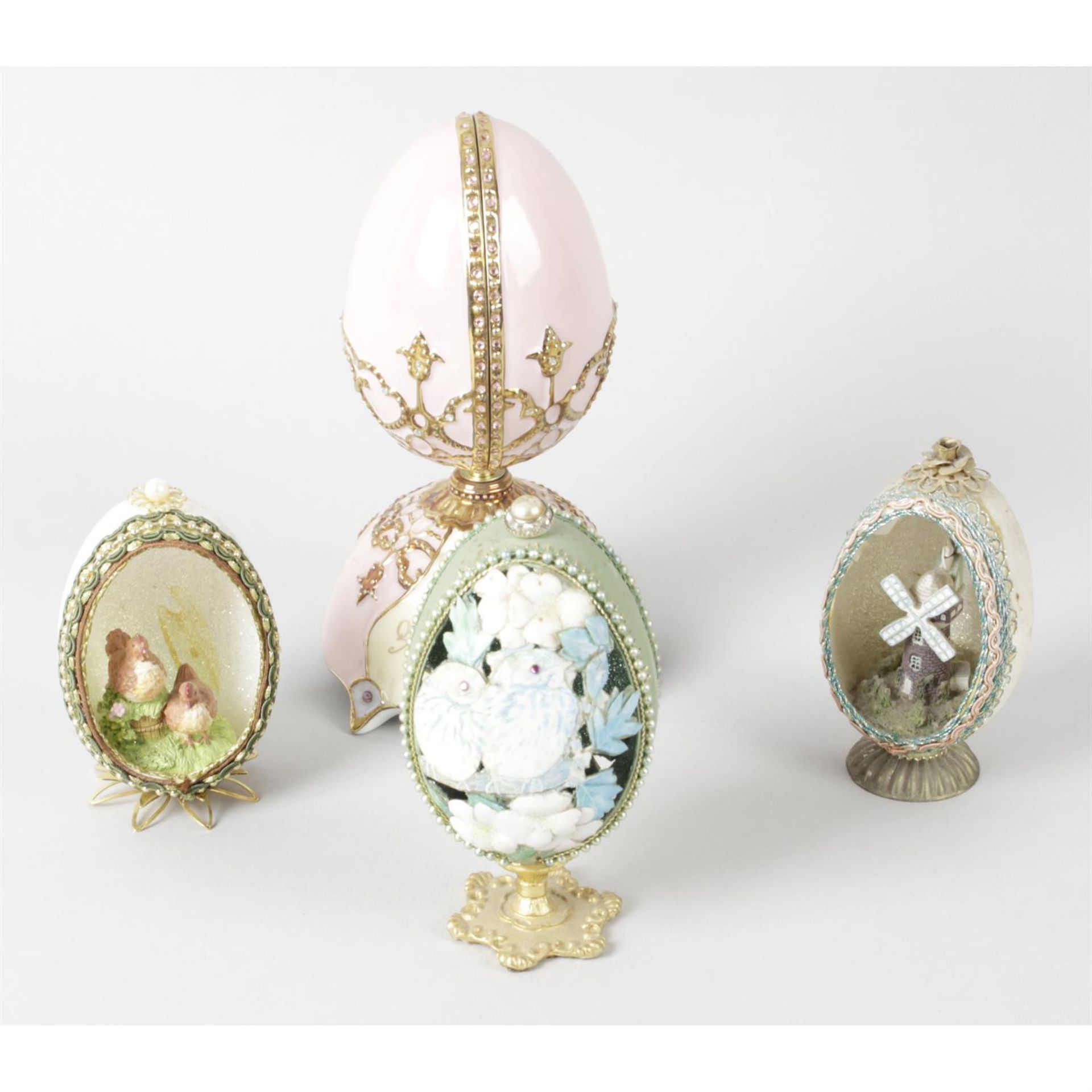 A collection of decorative ornamental eggs.