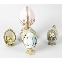 A collection of decorative ornamental eggs.
