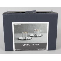 A Georg Jensen two piece espresso cup and saucer set.