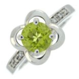 Peridot floral ring, with diamond shoulders, by Mauboussin