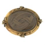 Mid Victorian woven hair mourning brooch