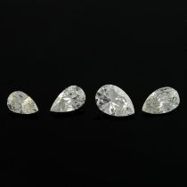 Four pear-shape diamonds, 0.91ct