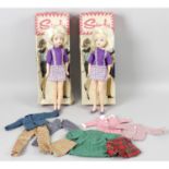 Two boxed Sindy Dolls and assorted clothes