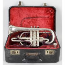 Cased cornet and a cased clarinet