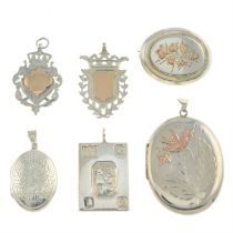Two silver lockets, a stamp pendant, two medalions and a brooch.