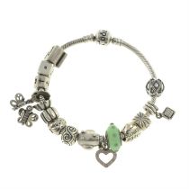 A bracelet, with assorted charms, by Pandora